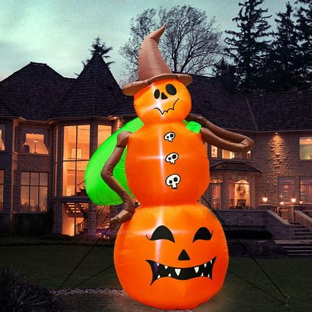 Transform Your Front Yard with a Pumpkin Inflatable and Witch Hat Combo